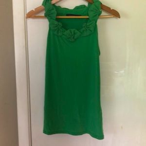 The limited sleeveless blouse. Super flattering fit